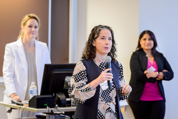 Mielle Marquis, Director of External Relations, with conference co-chairs Karen OMalley 94 (center) and Mala Rafik 97.