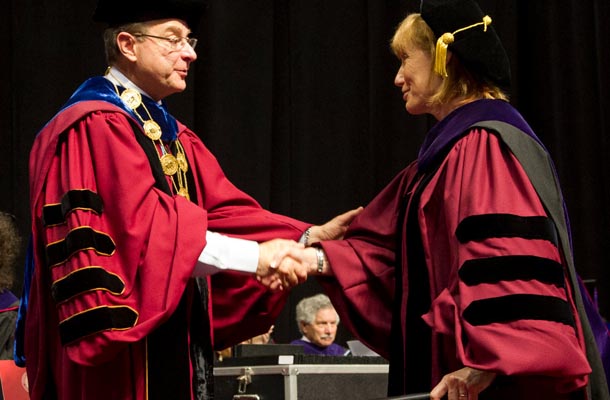 New Hampshire Governor Margaret Wood Hassan, right, shook hands with President Joseph E. Aoun after delivering the commencement address.