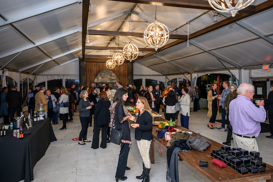 On Saturday night, we hosted an in-person reception in Northeastern’s lodge-themed tent for graduates celebrating milestone reunion years.