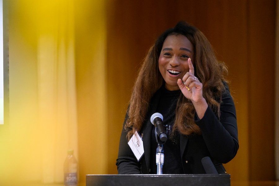 Tara Dunn, ’17, speaks at the Civil Rights and Restorative Justice Project (CRRJ) archive launch and student recognition event about her work on Henry Gilbert’s case and the impact it had on her. A member of Gilbert’s family, back center, was in attendance at the event held in Columbus Place.