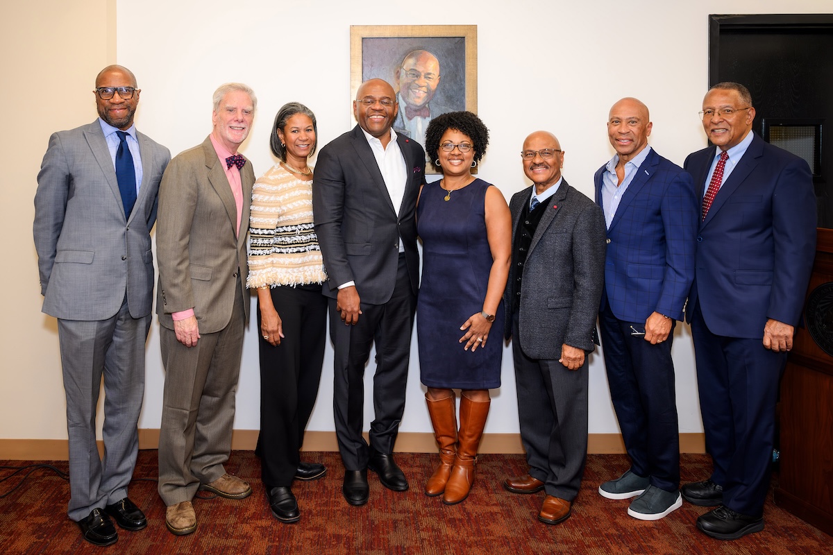 Left to right: Left to right: James Hackney, dean of Northeastern Law; Roger Michel, executive director of the Institute for Digital Archaeology; the Honorable Kimberly Budd, chief justice of the Massachusetts Supreme Judicial Court ; the Honorable William “Mo” Cowan ’94, chief legal and external affairs officer for Devoted Health; Stacy Cowan ’97, founder/CEO at SLC Advisory Services; Emmanuelle Miller; the Honorable Deval Patrick, former governor of Massachusetts; and the Honorable Roderick Ireland, former chief justice of the Massachusetts Supreme Judicial Court.