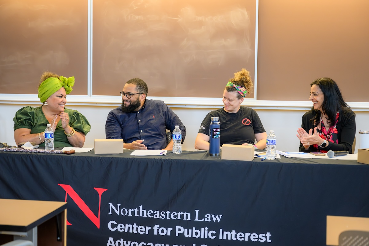 Left to right: Elizabeth Yeampierre ’83, Miles Gresham, Sophia Owen ‘14 and Professor Sharmila Murhty