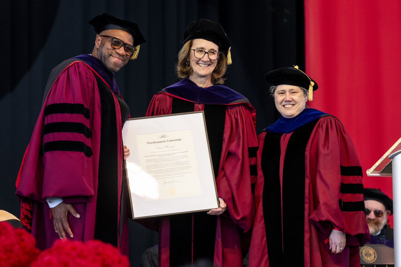 Dean James Hackney and Provost Beth Winkelstein (right) presented a special citation to Lois Dehls Cornell ’86